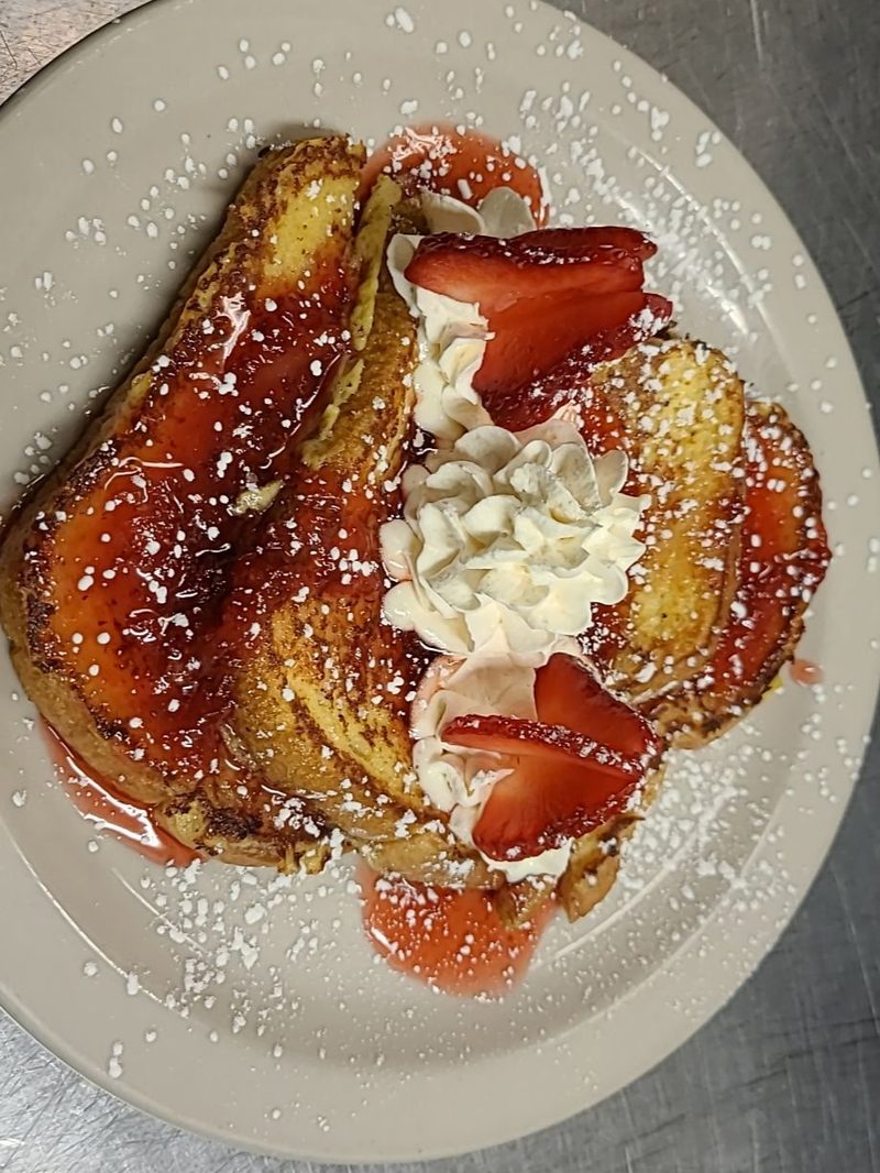 French toast with strawberries and whipped cream